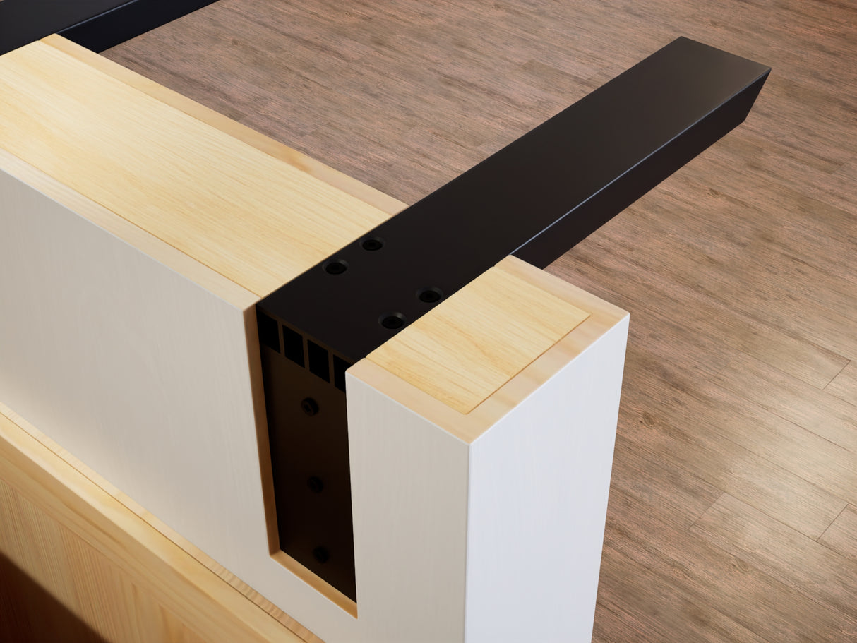 Top view of a black industrial L Bracket affixed to a wooden knee wall.