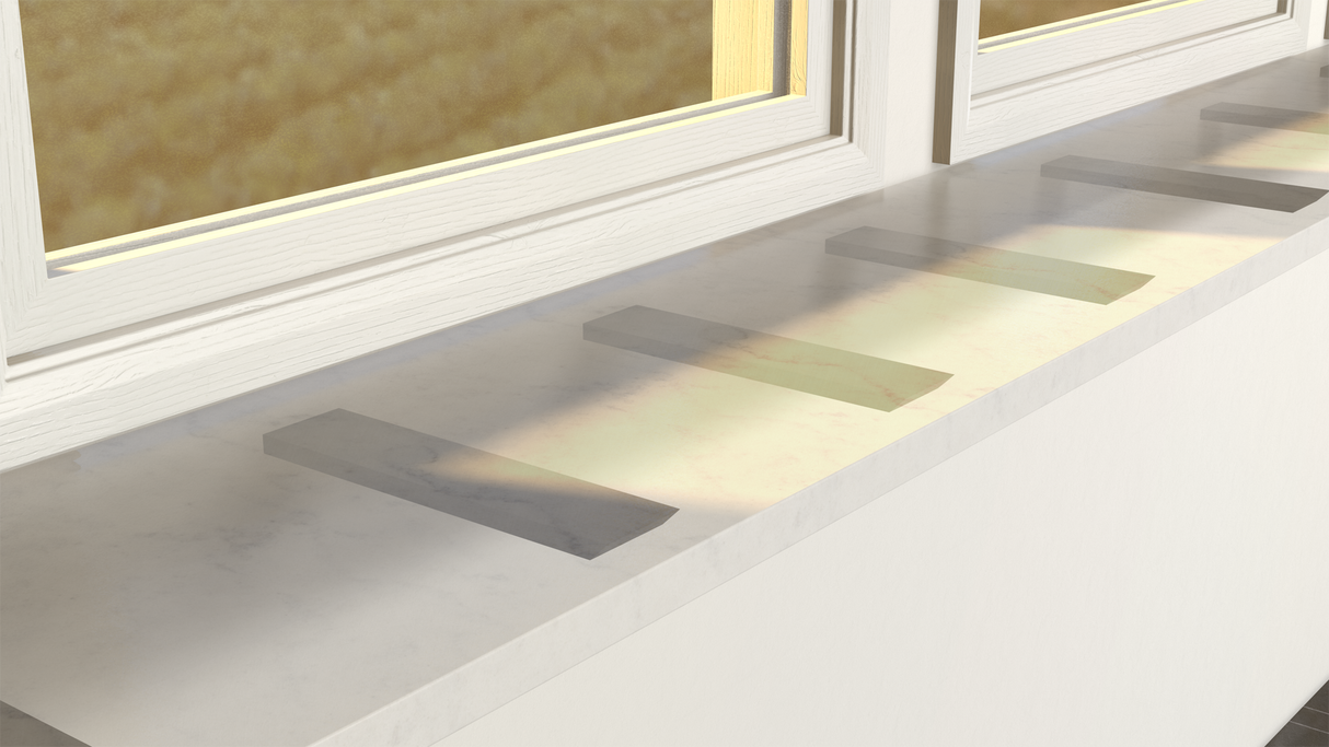 A close-up image of a window bar shelf held in place by the side wall free hanging shelf bracket.