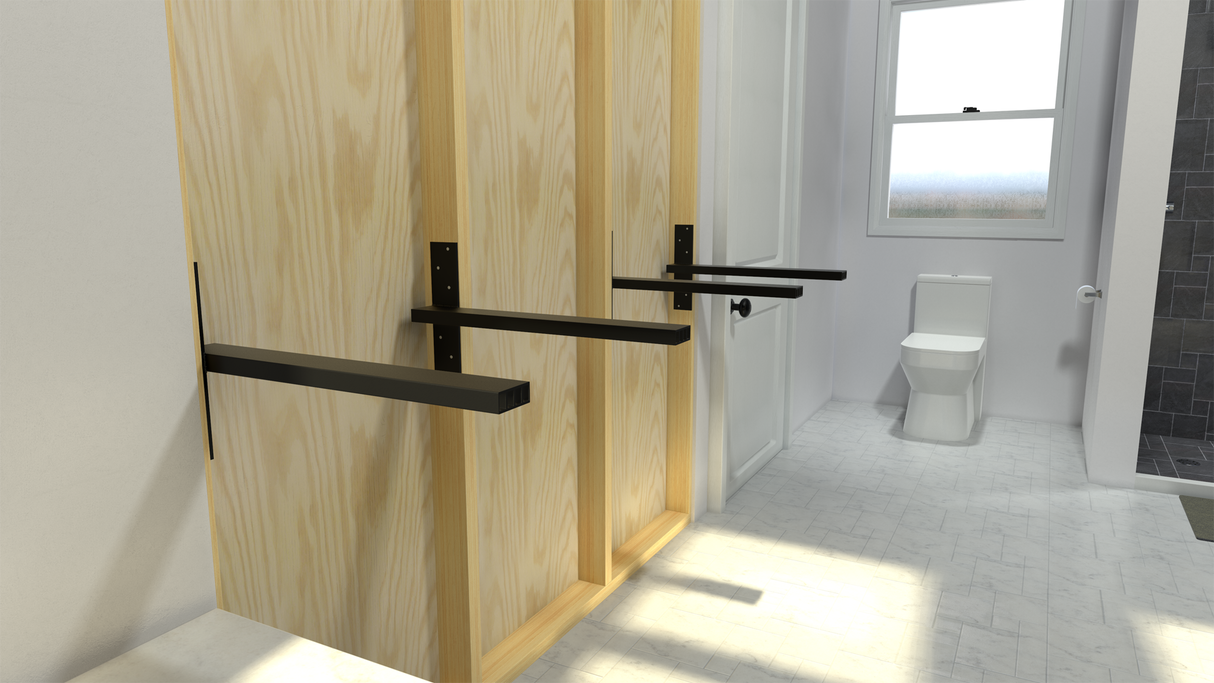 4 Free Hanging Shelf Brackets exposed on an unfinished wall attached to plywood in a bathroom with a white toilet below a window in the background.